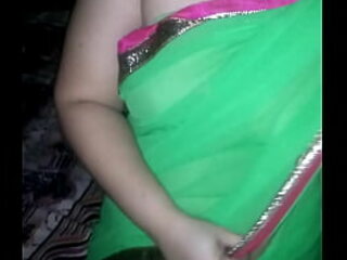 Shonali dressed adjacent to unfledged sari